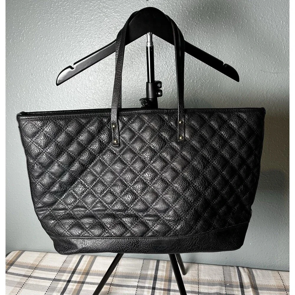 BCBG Women's Black Quilted Faux Leather Tote Bag with Tassel Accent